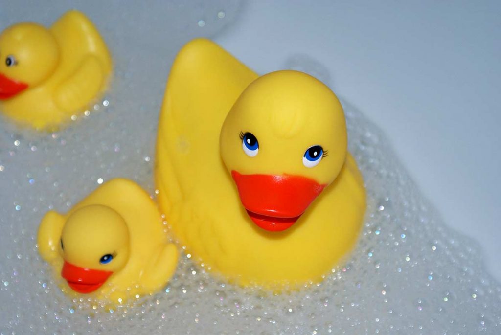 rubber ducks enjoying a bubble bath